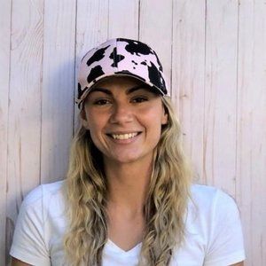 Pink and black cow print baseball cap